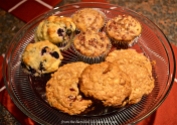 Blueberry Muffins: Tart Cherry Muffins; and Chocolate Chip, Oatmeal Cookies with Two Chocolates, Dried Cherries, and Almonds.