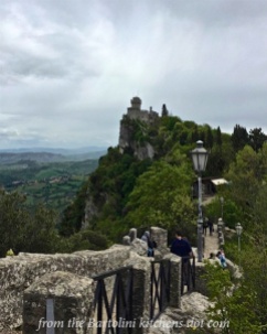 Walking along the wall to another tower of San Marino